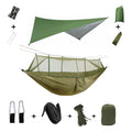 Camping hammock with mosquito net and rain fly