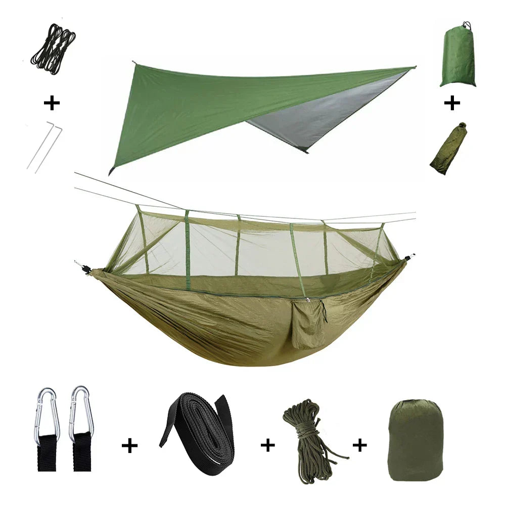 Camping hammock with mosquito net and rain fly